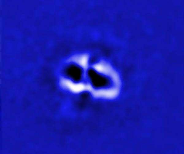 Astronomers Spy Quartet of Cavities from Giant Black Holes