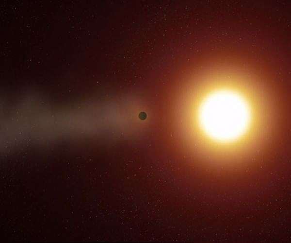 Discovery of a planet with a shifting gas tail