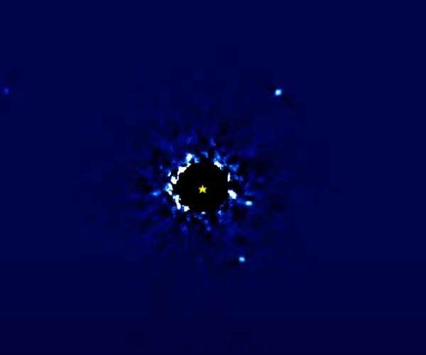 Watch distant worlds dance around their sun