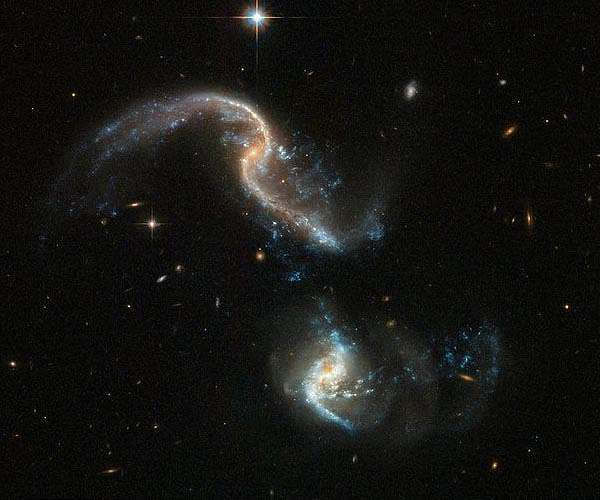 Hubble offers new image of dramatic galactic collision