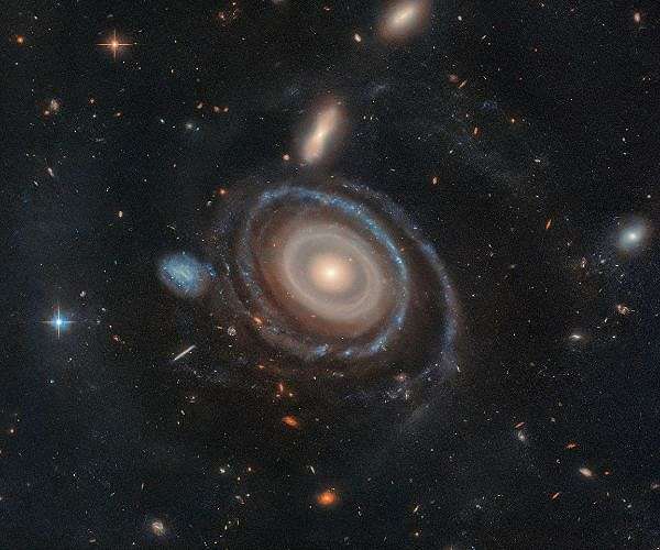 Hubble Data Highlights Nine Mysterious Rings in Gigantic Galaxy