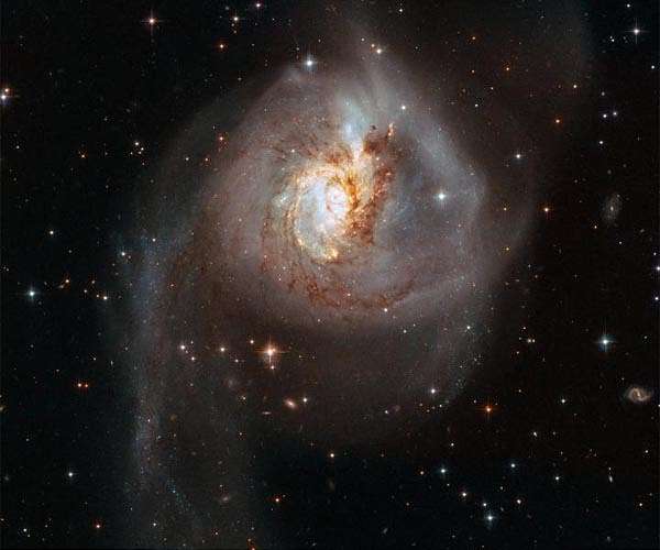 Cosmic collision lights up the darkness