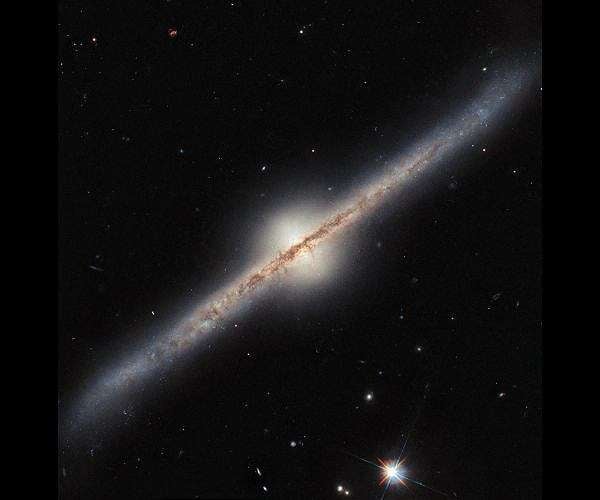 Hubble reveals edge-on spiral galaxy with unique structure