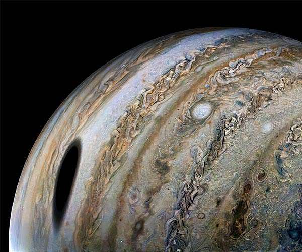 Juno captures moon shadow on Jupiter