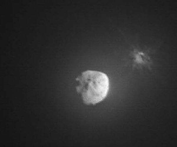 Astronomers hail first images of asteroid impact
