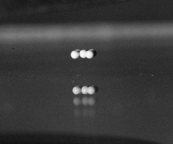 Scientists levitate particles with sound to find out how they cluster together