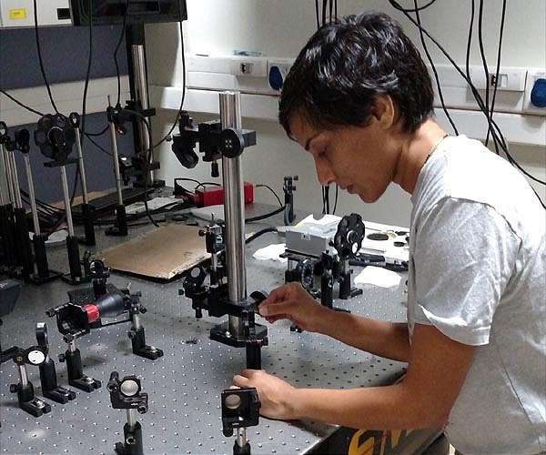 AFRL engineer highlights illuminating photonics work in lab life podcast