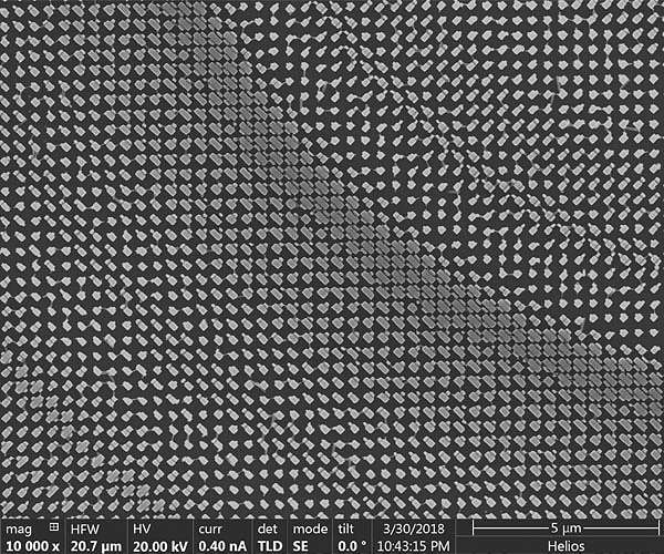 Broadband achromatic metalens focuses light regardless of polarization
