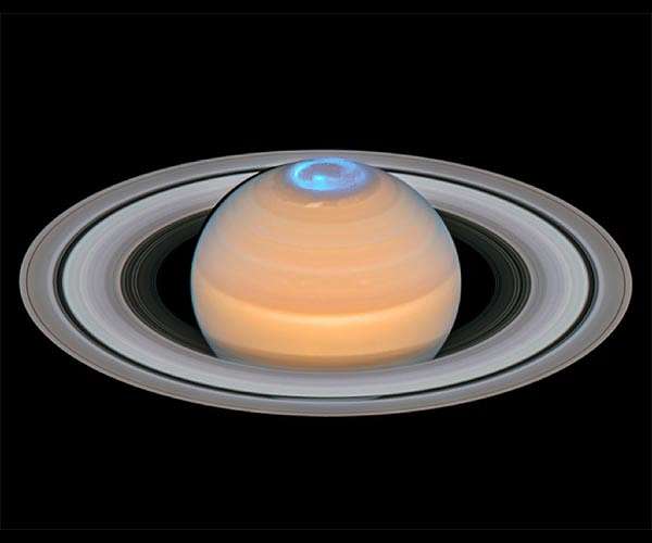 Hubble observes energetic light show at Saturn's north pole