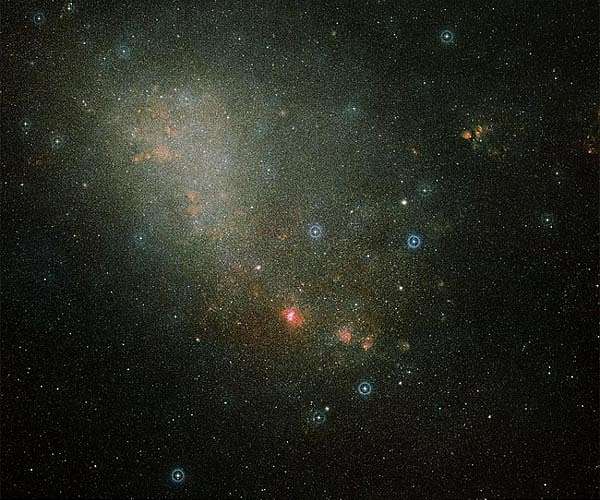 Beyond the Clouds: Finding Galaxies Behind Galaxies