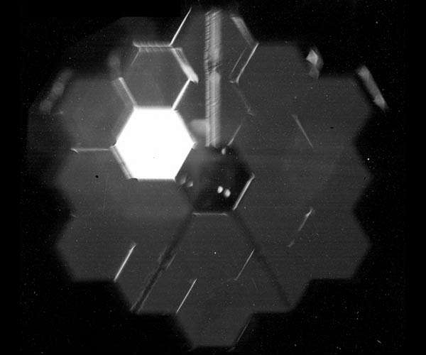 Webb telescope spots its first star -- and takes a selfie