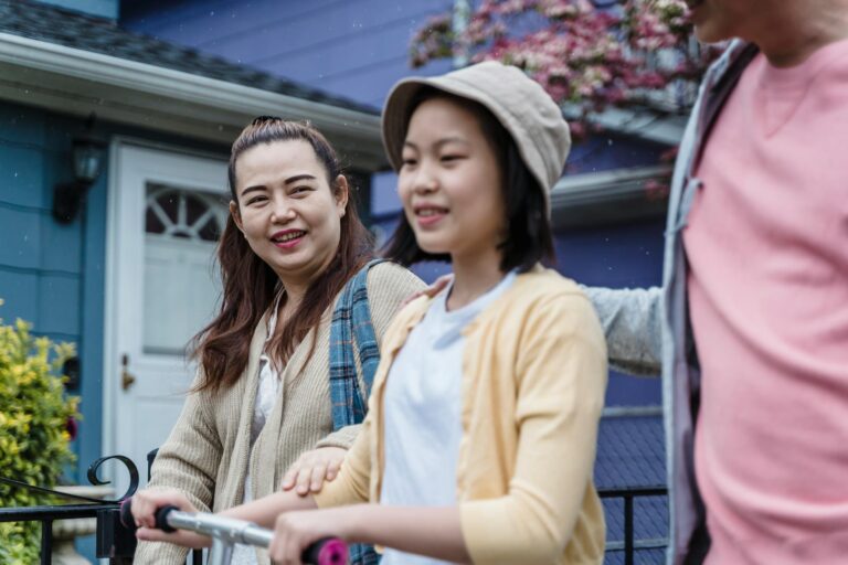 A cheerful family spending quality time together outdoors in a spring setting, showcasing love and connection.