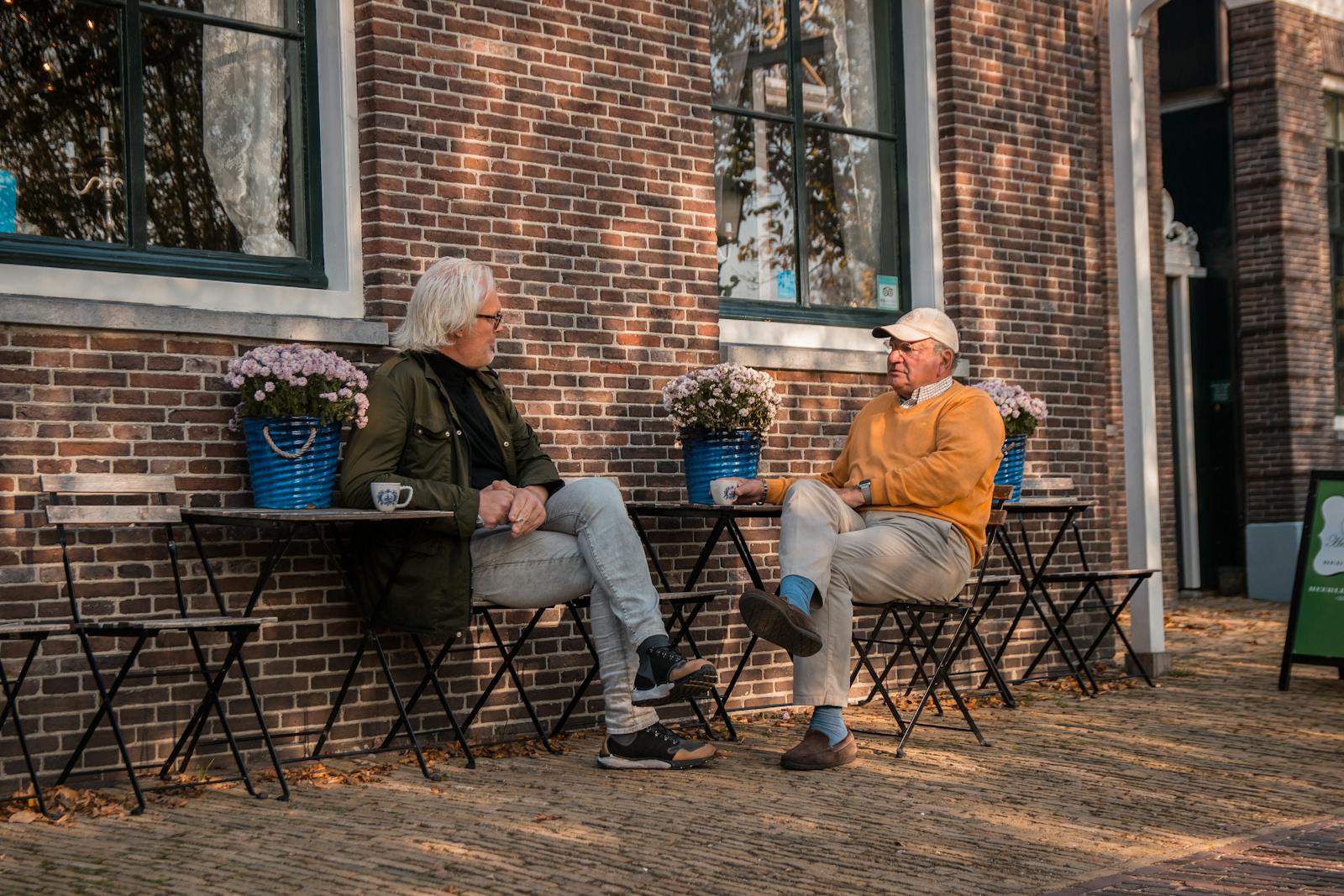 older man quiet conversation