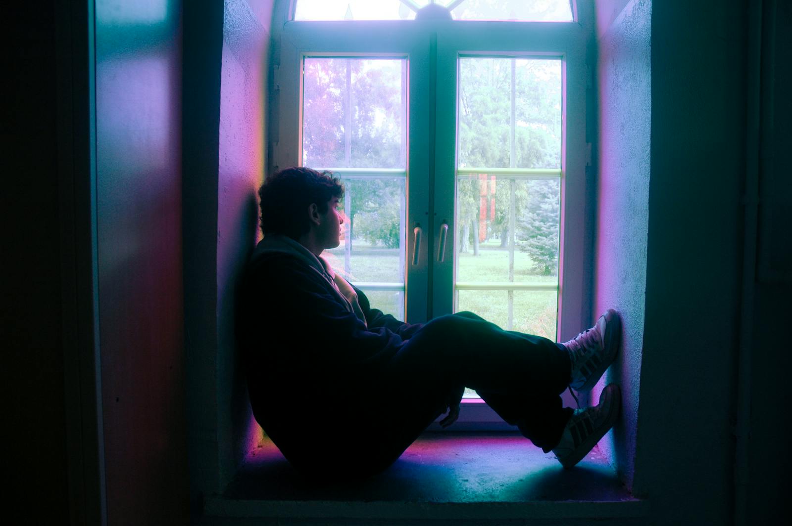 person calm window light