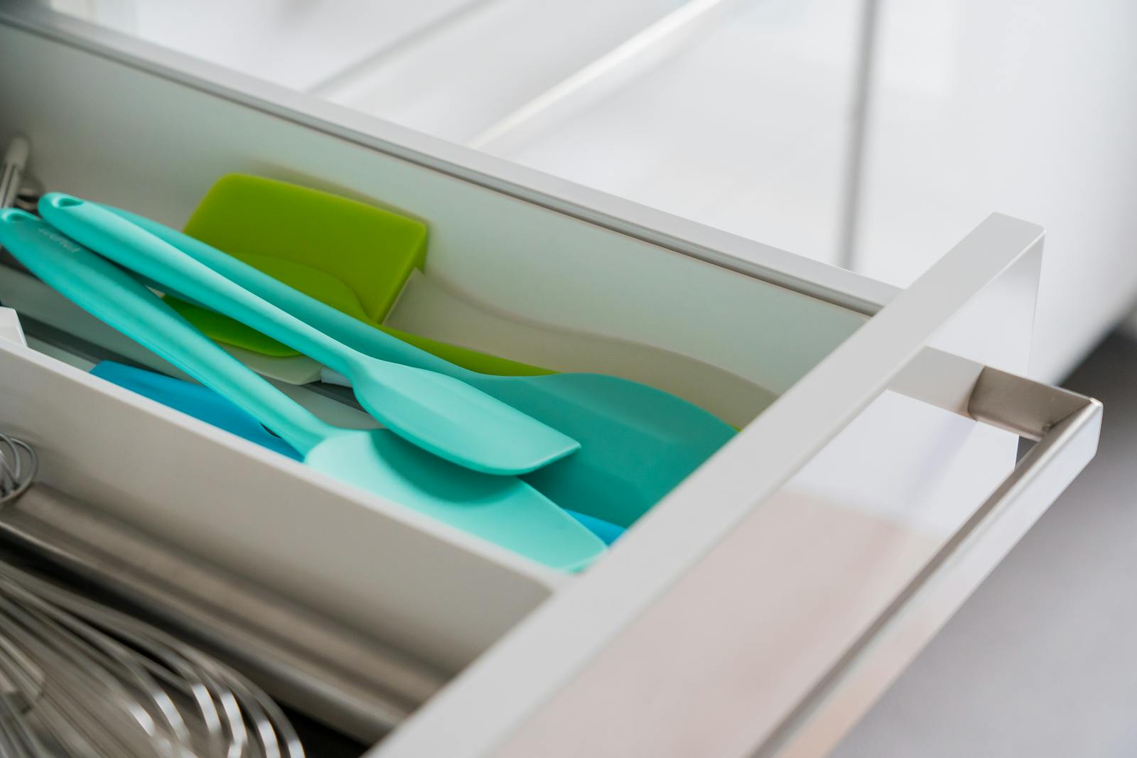 The people who keep one drawer in their kitchen completely organized while the rest of the house falls apart are managing something much larger than clutter