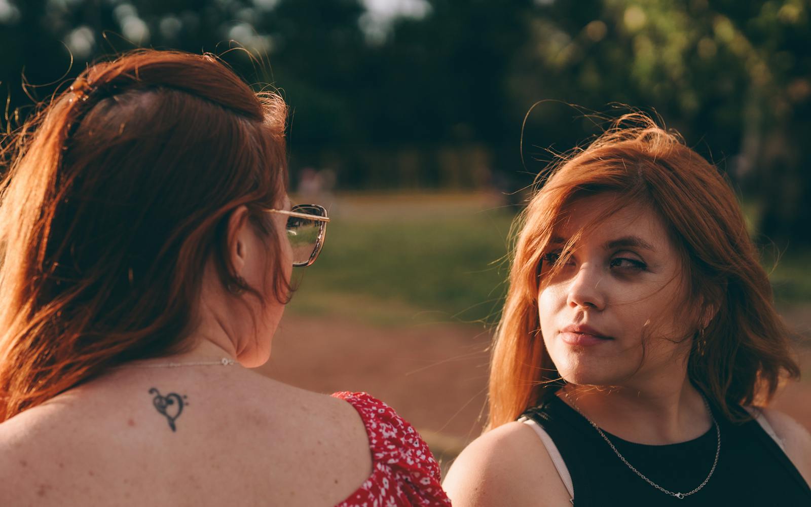 two friends quiet conversation