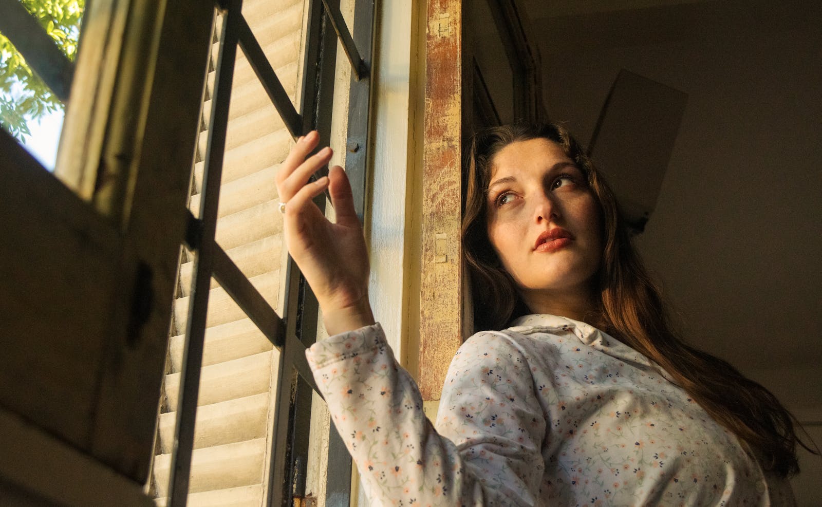 woman by window afternoon