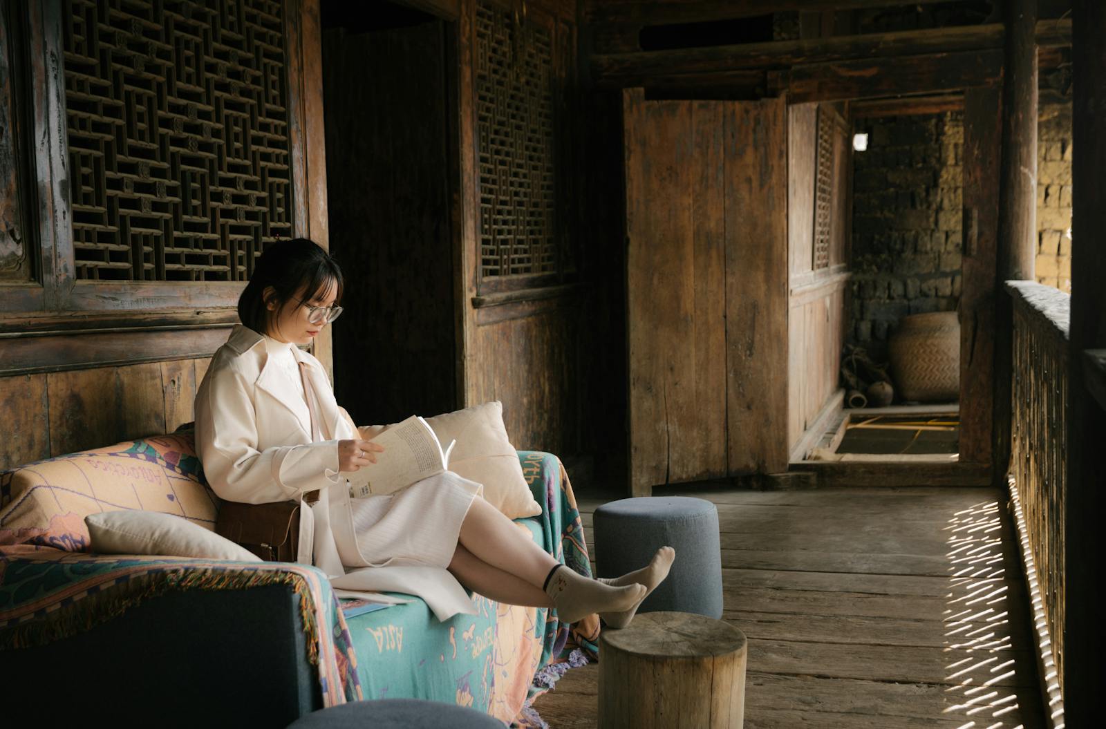 woman reading worn book