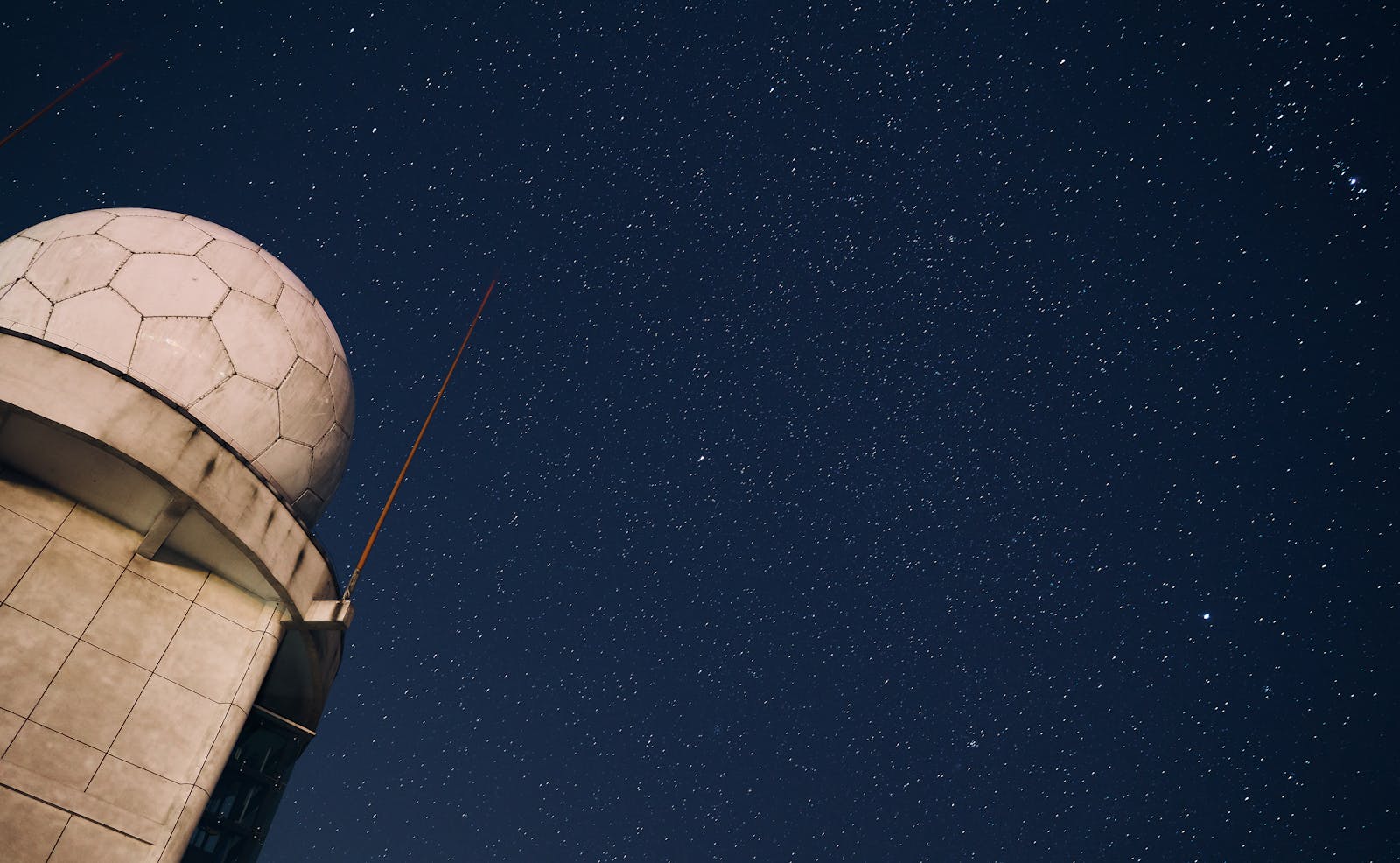 A galaxy cluster astronomers filed away as boring just lit up across two of the world's most sensitive radio arrays — and it rewrites what counts as a 'quiet' cluster