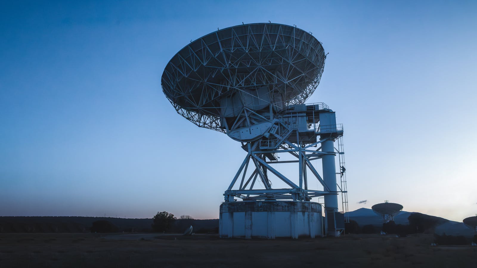 Australia keeps being described as a junior AUKUS partner — but the radar in its outback and the port in its northwest are quietly rewriting who controls orbital traffic
