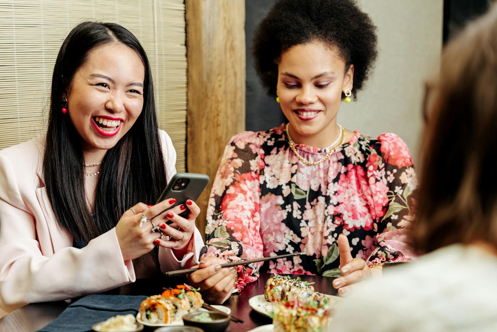 friends laughing dinner table