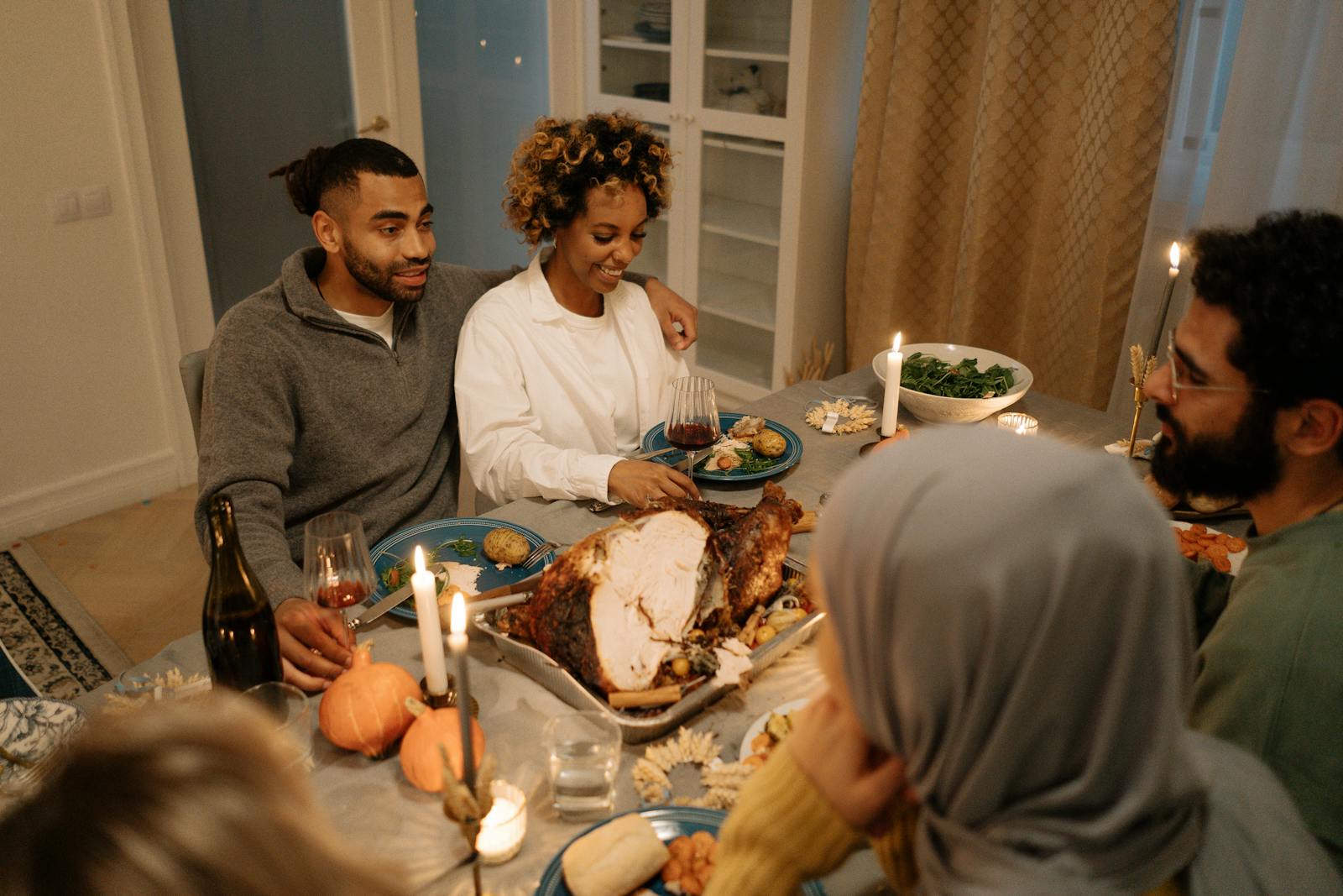 friends laughing dinner table