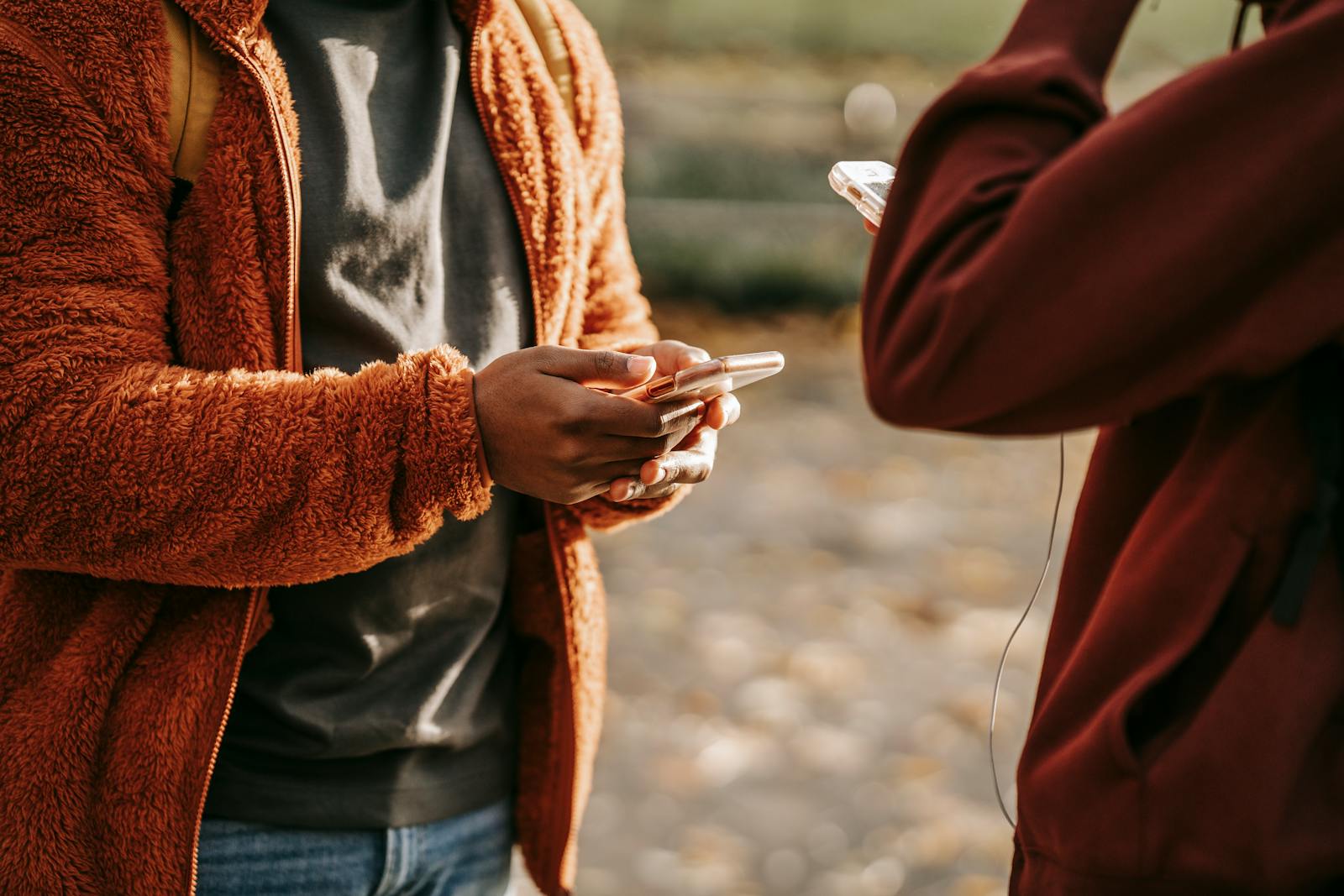 friends texting on phone