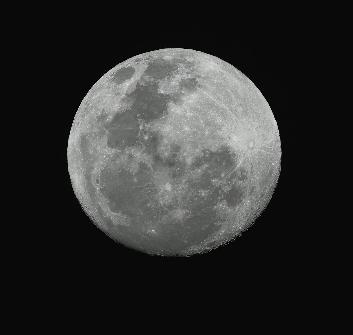 Captivating view of the full moon at night against a dark sky, photographed in Campbelltown, Australia.