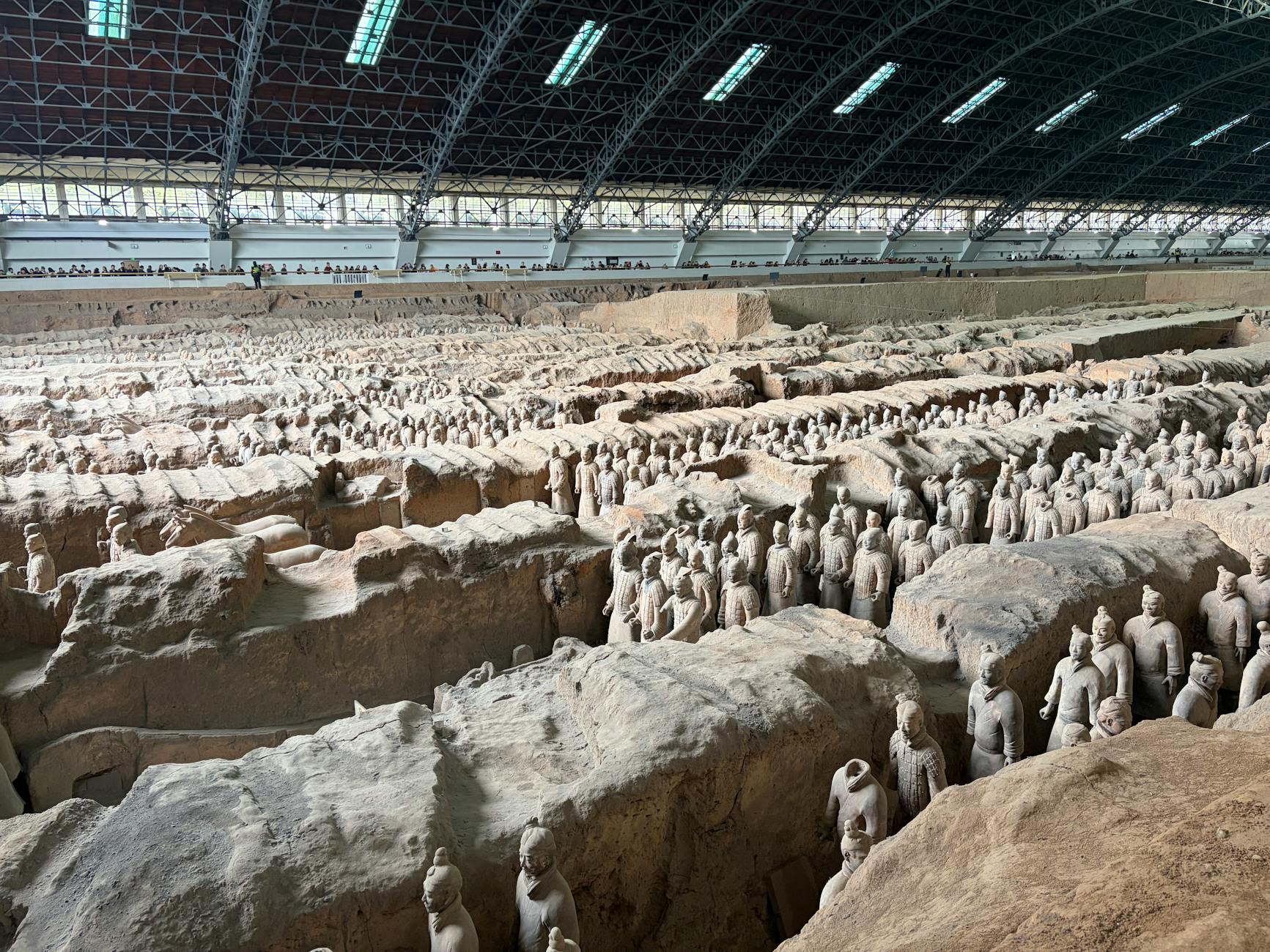 The ancient Terracotta Army figures in Xi'an, China at the archeological excavation site.