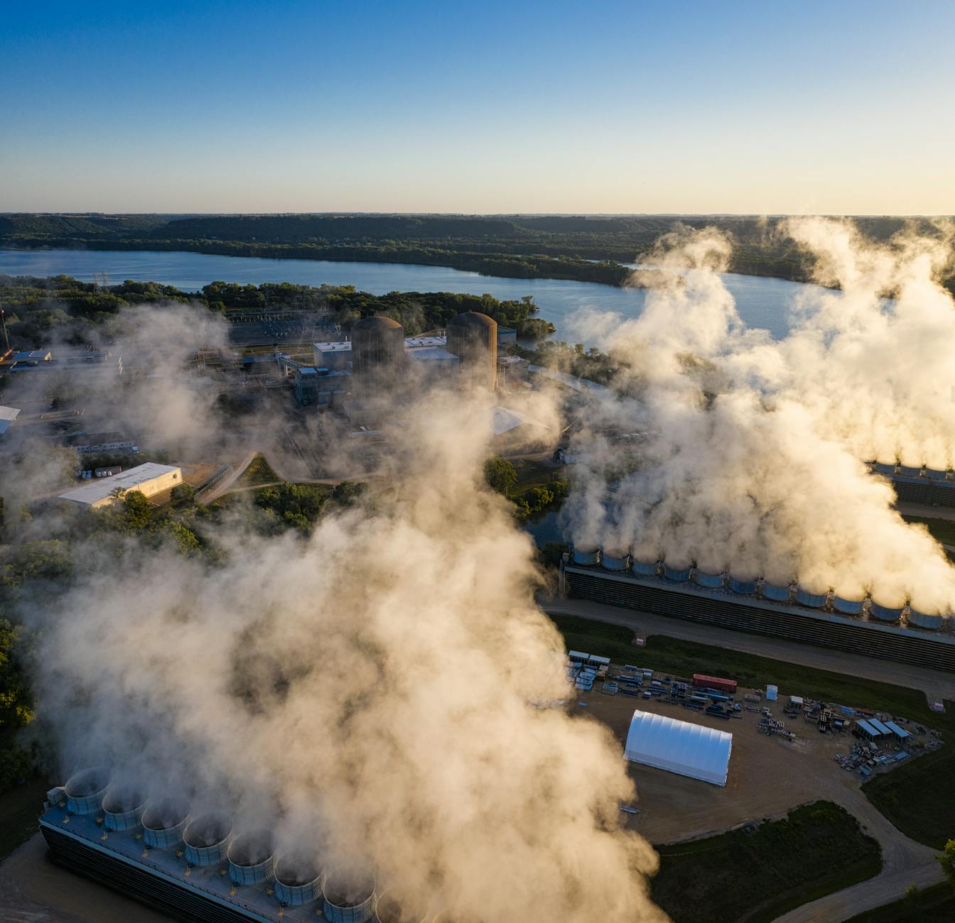 Drone shot of a power plant with emissions at sunrise near Welch, Minnesota, USA.