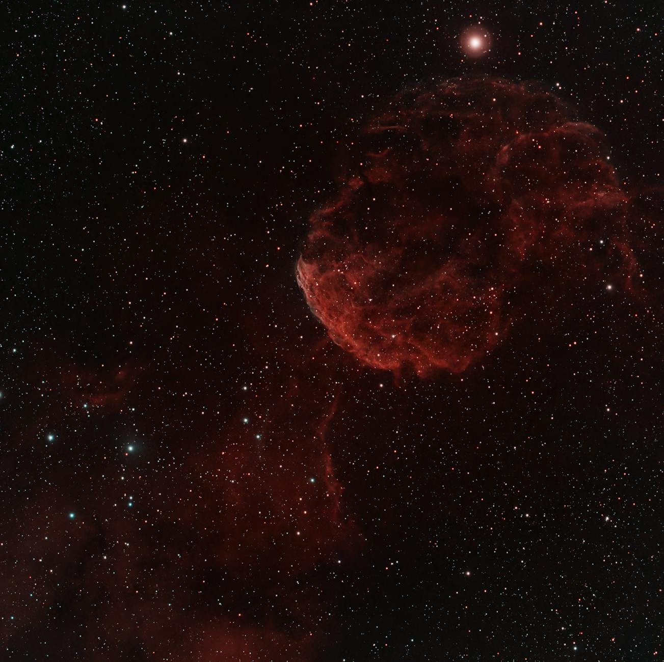 Capture of the Jellyfish Nebula amidst a star-filled sky from São Pedro de Alcântara, Brazil.