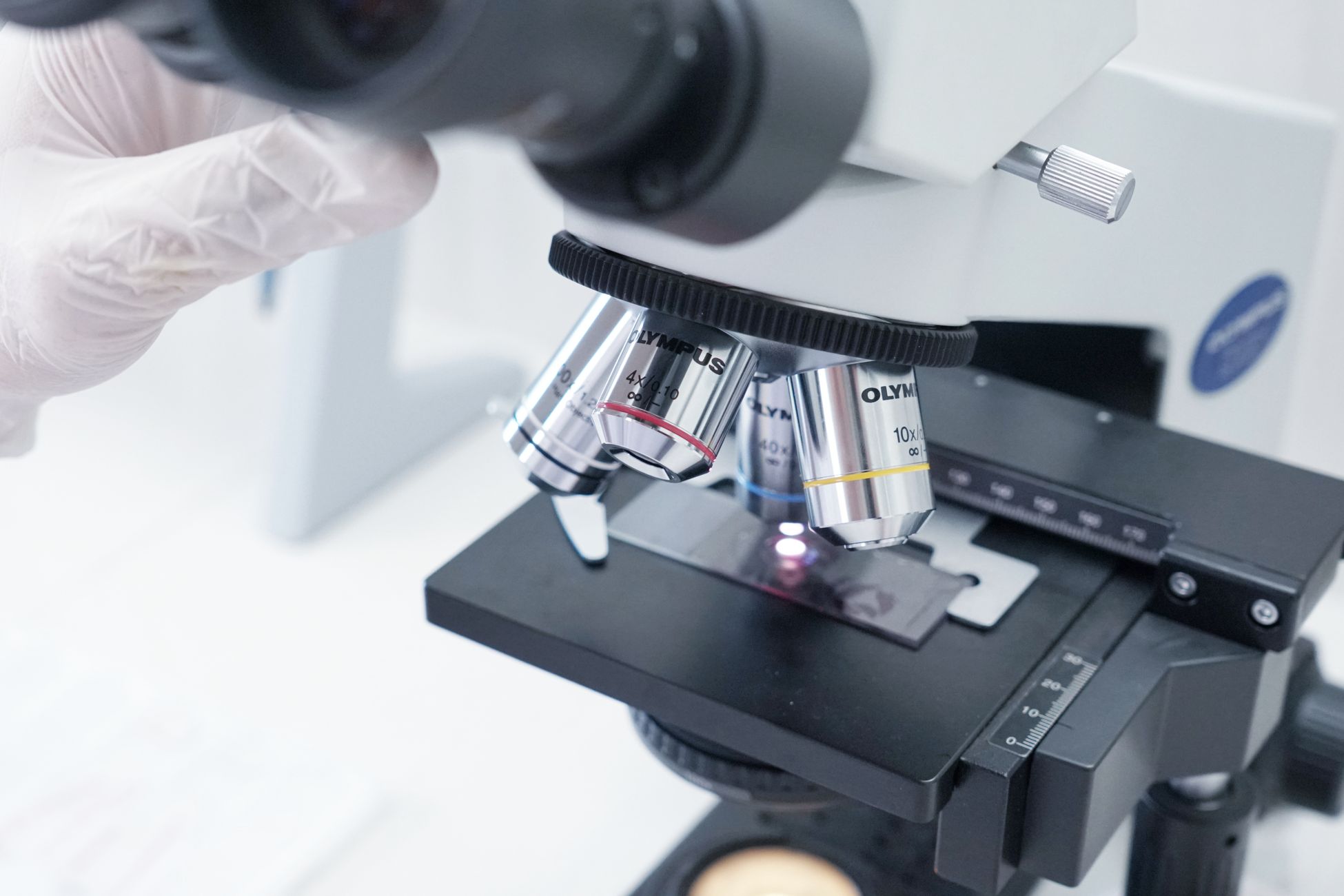 Detailed view of a microscope in a laboratory used in scientific research.