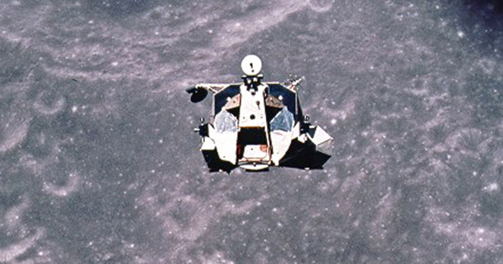 While Neil Armstrong and Buzz Aldrin walked on the Moon, Michael Collins orbited above them alone in Columbia — and for roughly 47 minutes of each orbit, when the body of the Moon itself blocked radio contact with both Earth and the lunar surface, he was a single human being with the entire Moon between himself and every other living person