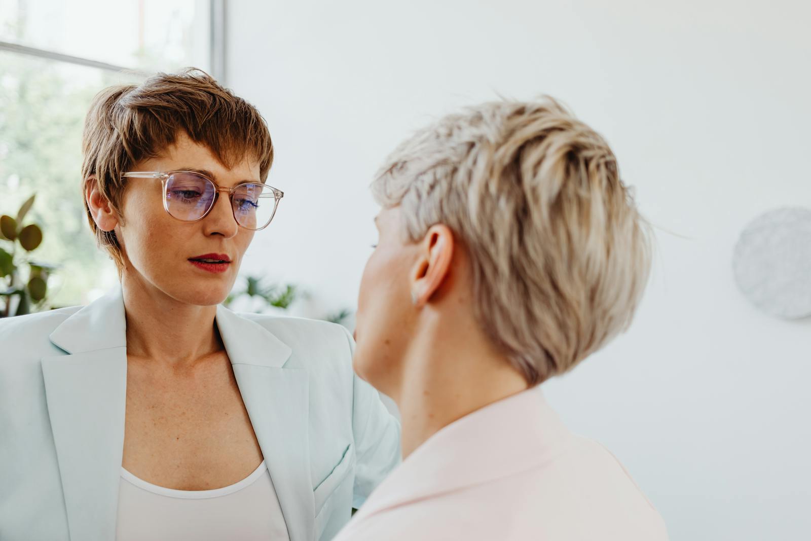 woman apologizing in conversation