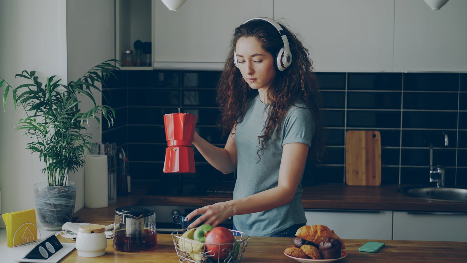 woman listening to radio kitchen