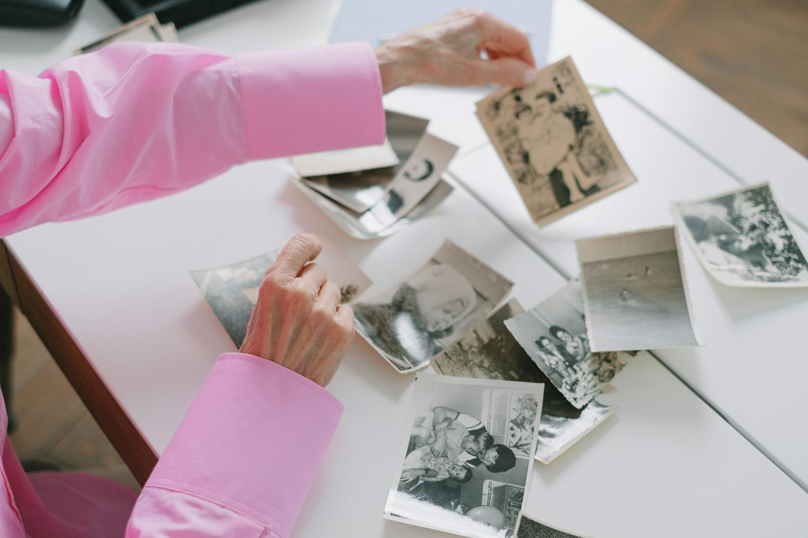 woman looking at photographs