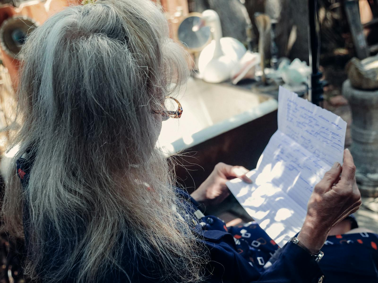 woman reading old letter