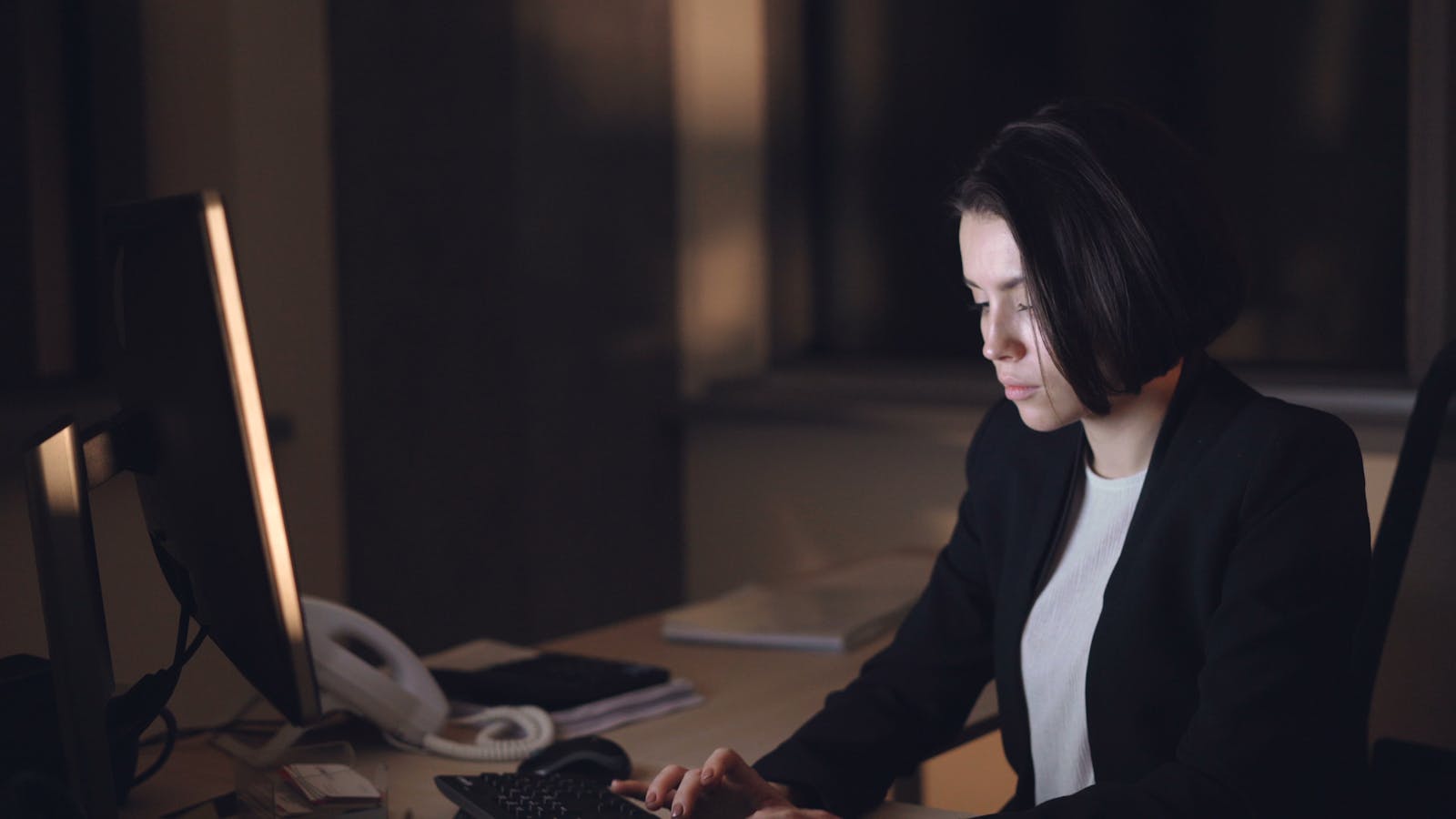 woman working alone office