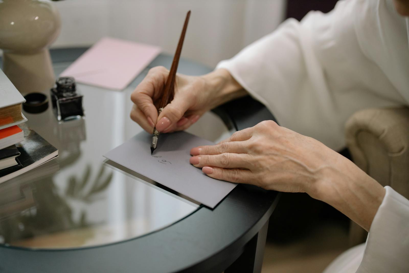 woman writing apology note