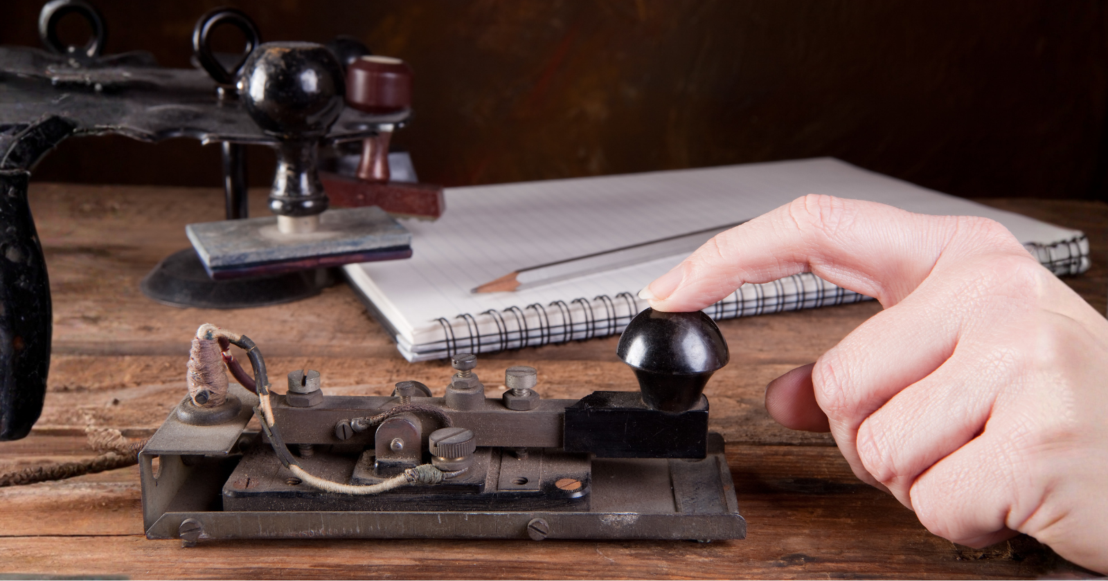 During the 1859 solar storm, telegraph operators disconnected their batteries entirely — yet messages kept flowing on the storm's own current as sparks showered from the machines and the paper caught fire
