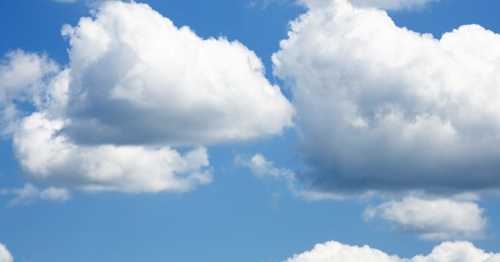 A single cumulus cloud — the kind that looks like a fluffy white pillow drifting across a summer sky — typically contains hundreds of tons of water by weight, suspended in the air because the water droplets are small enough that air resistance keeps them aloft against the pull of gravity