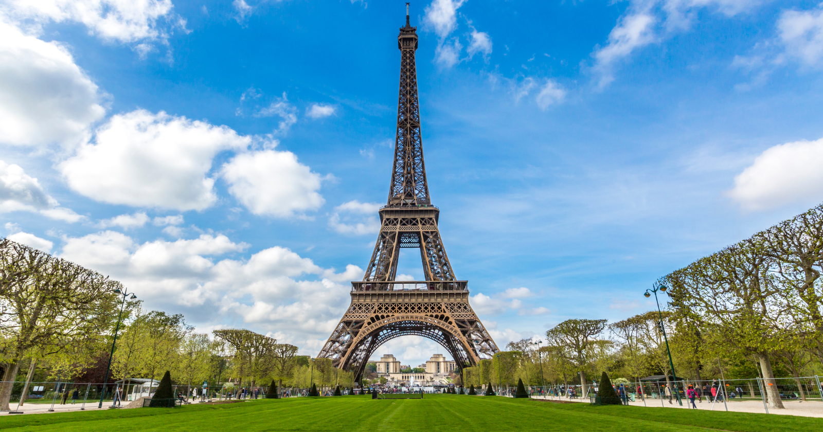On a sunny day, the top of the Eiffel Tower slowly drifts in a small circle about six inches wide — it isn't the wind, it's the sun, heating one side of the iron at a time and making the whole tower lean a little away from whichever side is warmest