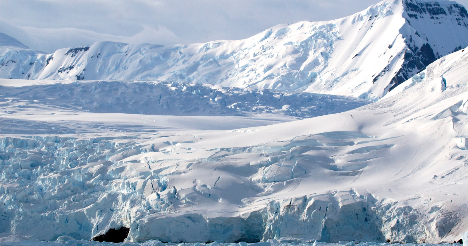 The lowest natural temperature ever recorded on Earth was minus 89.2 degrees Celsius, measured at Antarctica's Vostok research station in 1983 — cold enough that a cup of boiling water thrown into the air freezes before it hits the ground, exhaled breath crystallizes audibly into ice fog, and steel becomes brittle enough to shatter on impact