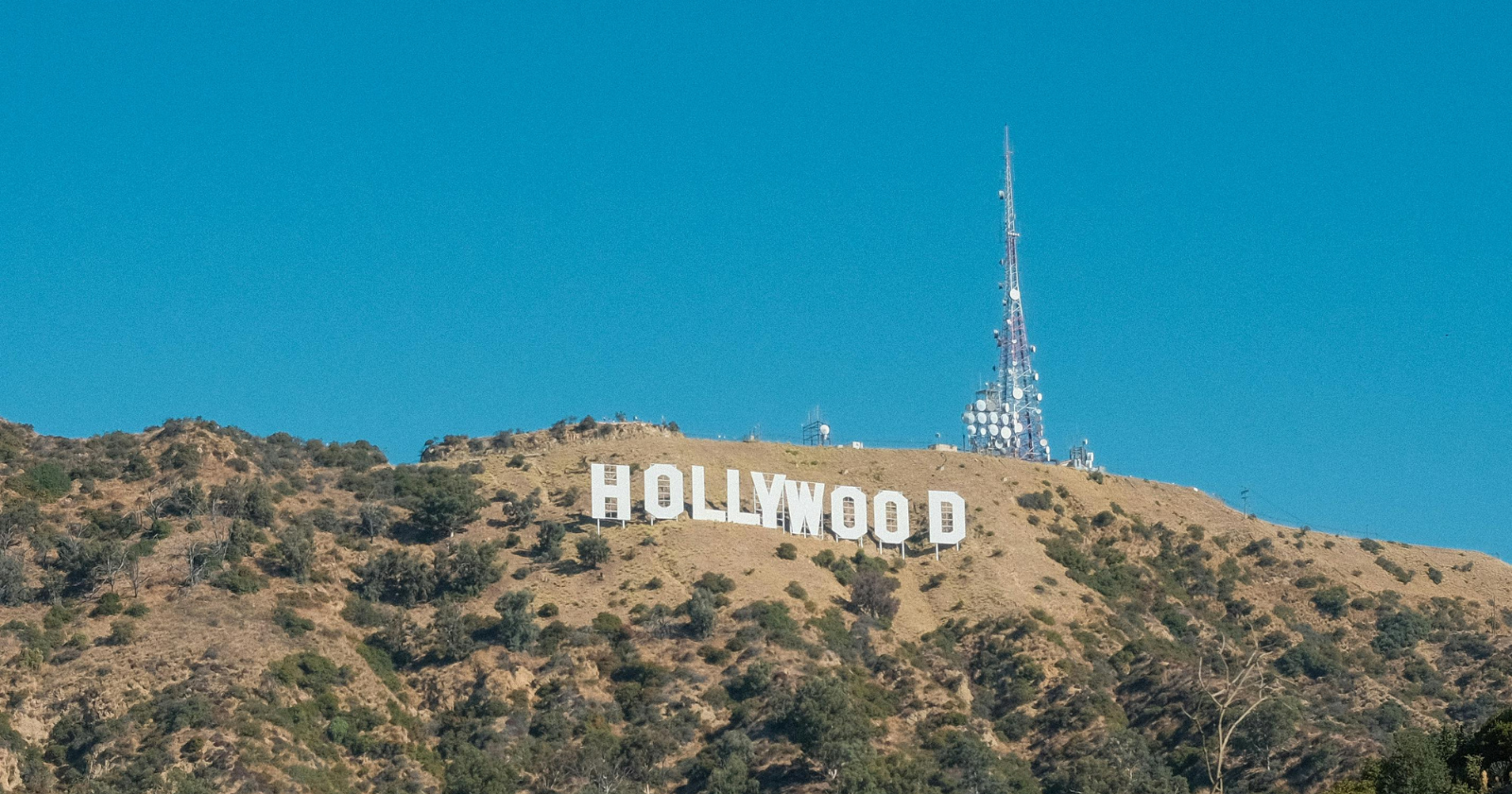 The Hollywood sign was erected in 1923 as a temporary $21,000 advertisement for a hillside real estate development called Hollywoodland — meant to come down after 18 months, but the developers found it useful, the public grew attached, the city inherited it in 1944, and the most famous sign on the planet is technically the leftover billboard for a real estate project from a century ago