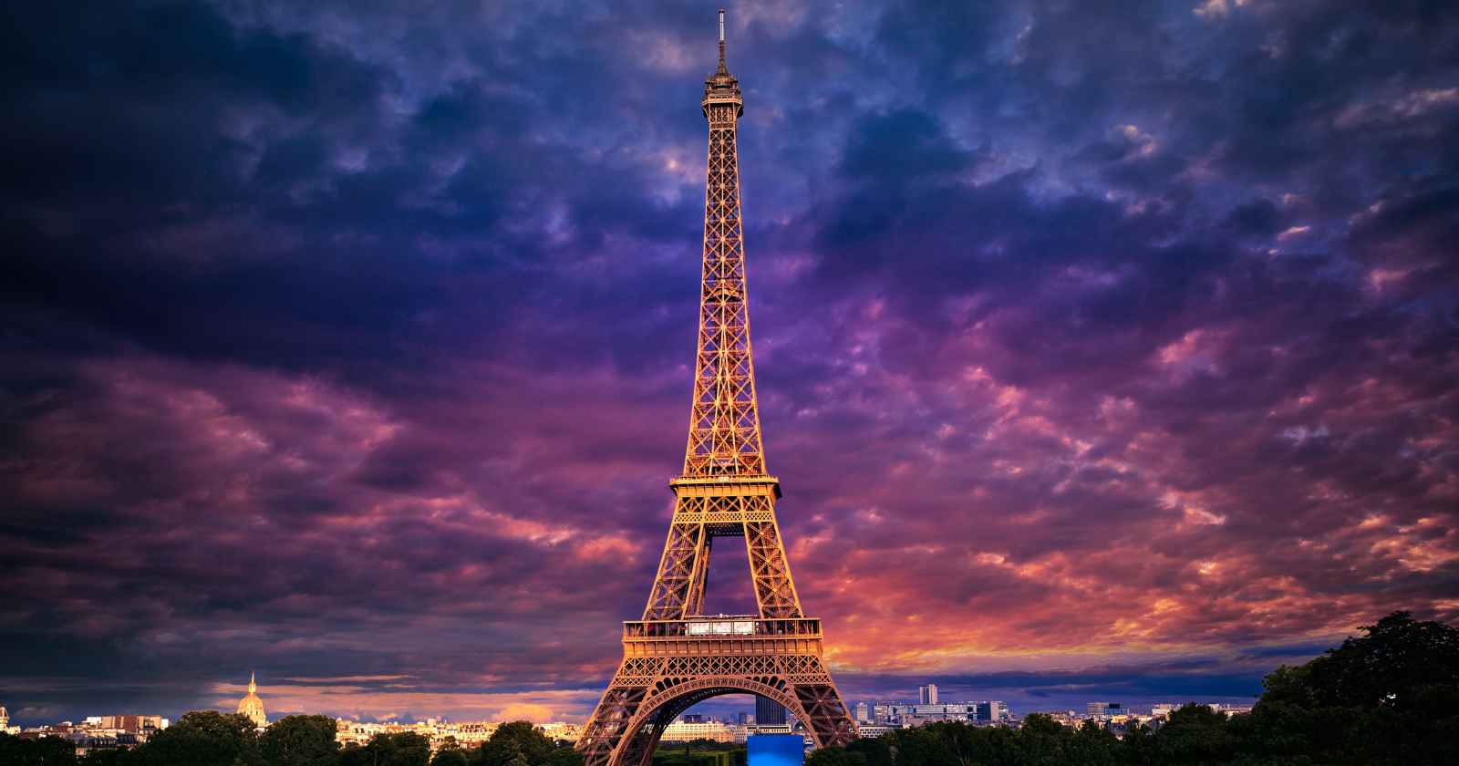 The Eiffel Tower, now the most photographed structure on Earth, was built in 1889 as a temporary centerpiece for the Paris World's Fair — meant to be dismantled after 20 years — and was saved from demolition in 1909 only because Gustave Eiffel himself arranged for the French military to use its iron lattice as a radio antenna for transmitting wireless signals across long distances
