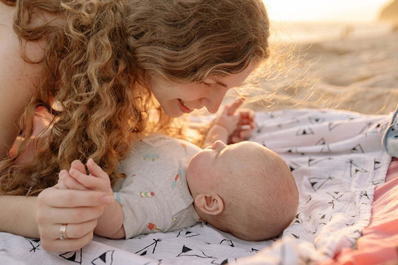 In 1975, the developmental psychologist Edward Tronick filmed mothers dropping their faces into a blank mask and found that even securely attached pairs fall out of sync roughly seventy percent of the time, and that what holds the bond together is not the match but the repair that follows the rupture