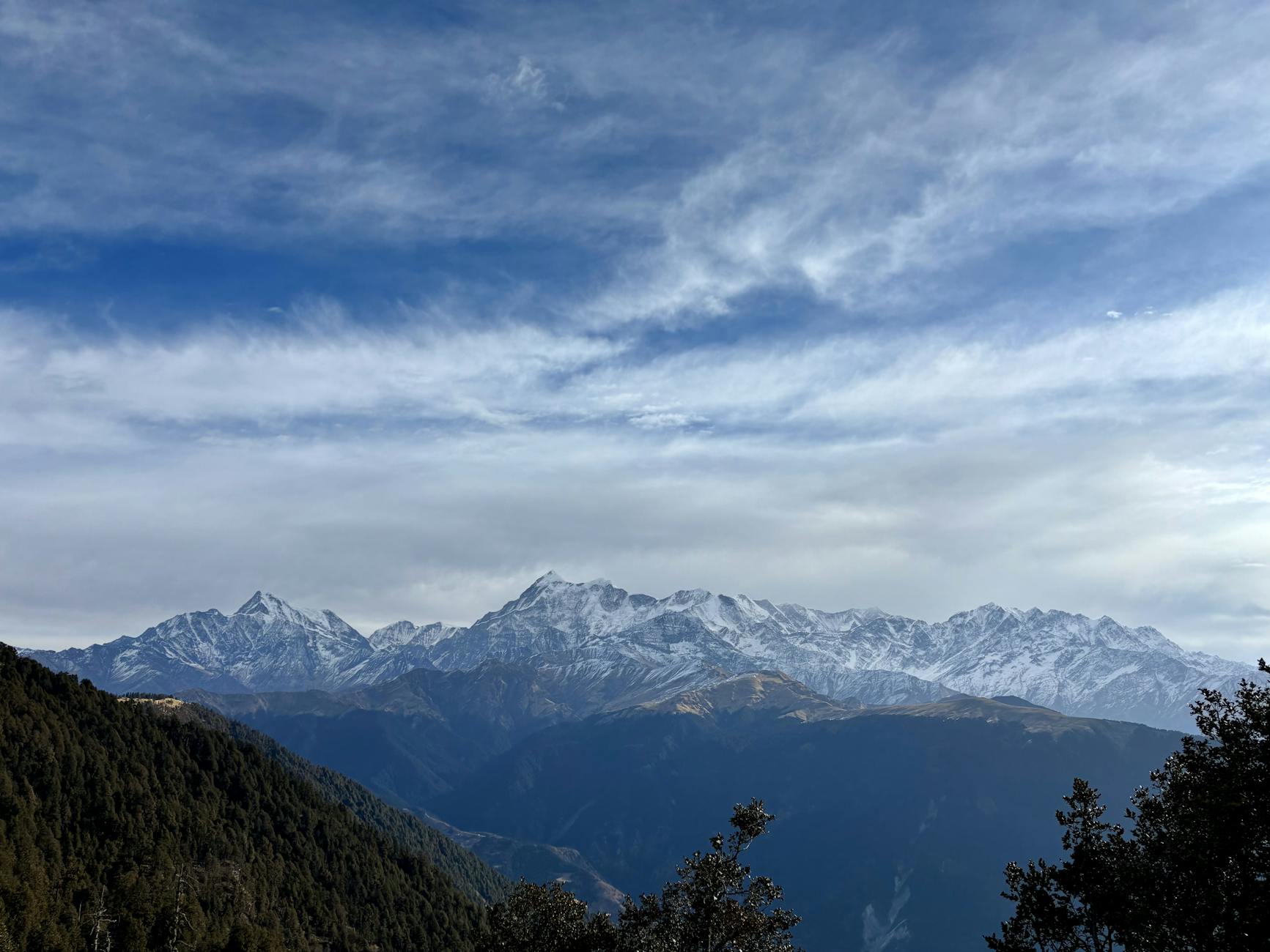 Majestic view of the snow-capped Himalayan peaks in Chamoli, Uttarakhand.