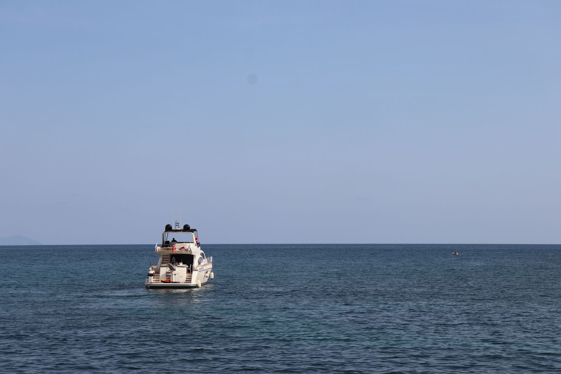 A luxury yacht sails on the tranquil waters of the Mediterranean near Alanya, Antalya, Türkiye.