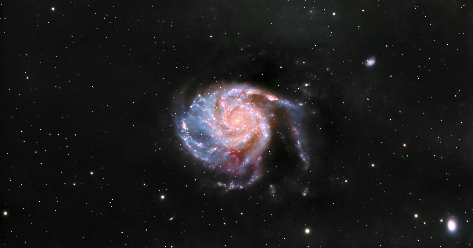 In 1995, astronomers aimed the Hubble Space Telescope at a tiny patch of sky that looked almost empty – a dark spot near the Big Dipper no wider than a pinhead held at arm’s length. After 10 days of exposures, the darkness resolved into roughly 3,000 galaxies, hiding in a place where the human eye saw nothing at all.