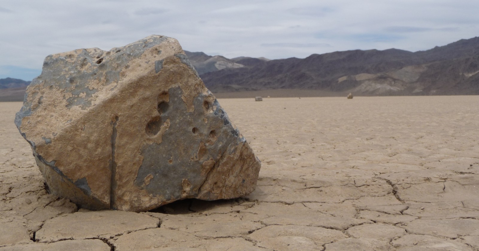 For decades the heavy rocks that carve trails across a Death Valley lakebed were never seen moving, until cameras caught them gliding on thin rafts of melting ice pushed by a light wind